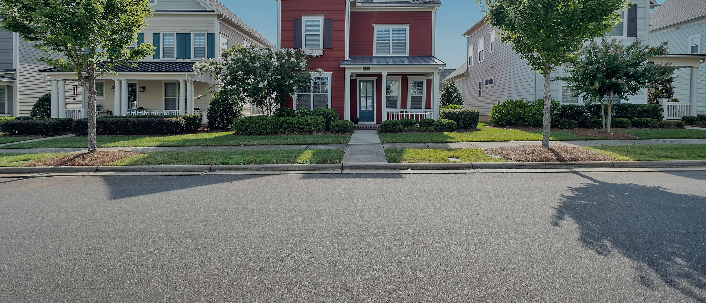 A classic American home on a tree lined suburban street